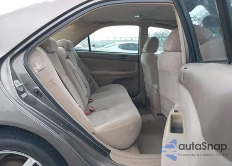 2003 Toyota Camry Le from USA, damaged, VIN 4T1BE32K03U732051